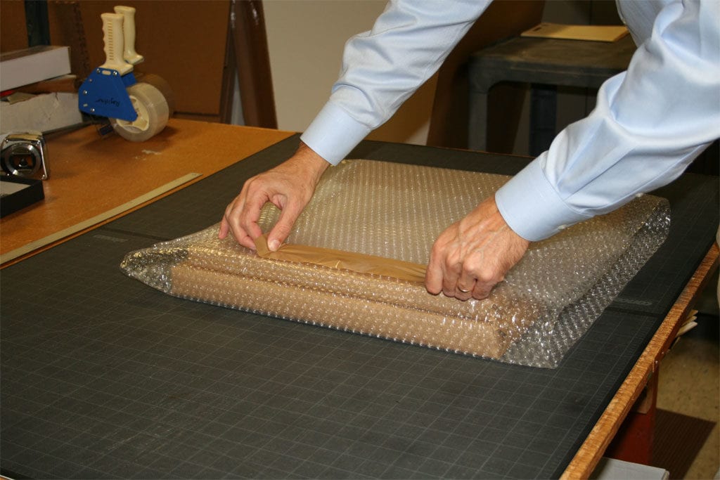 Package being wrapped in bubble wrap